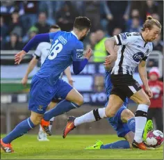  ??  ?? John Mountney breaks forward for Dundalk.