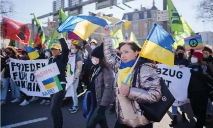  ?? ?? Protests against Russia’s invasion of Ukraine in Berne at the weekend. Photograph: Manuel Lopez/EPA