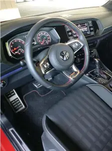  ?? JIM MAHONEY PHOTOS / HERALD STAFF ?? COMFY COMMUTER: The 2019 VW Jetta GLI has a roomy interior, blacked-out wheels and a sportier exterior.