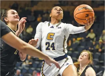  ?? STAFF FILE PHOTO BY MATT HAMILTON ?? UTC’s Jada Guinn (24) scored a game-high 27 points to help the Mocs close the regular season with a SoCon victory Saturday at Wofford.