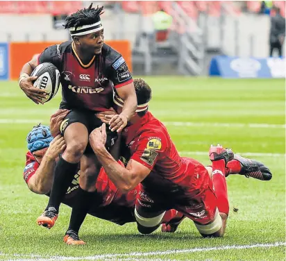  ?? Picture: GETTY IMAGES ?? BIG BLOW: Southern Kings Oliver Zono seen here being tackled by Scarlets players during the Guinness PRO14 at Nelson Mandela Bay Stadium in Port Elizabeth on Sunday. Zono will miss Friday’s PRO14 match against Edinburgh after suffering a concussion