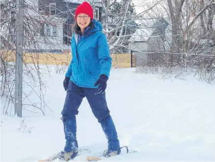  ?? BRIAN MRKONJIC ?? Janet Barlow, executive director of Hike Nova Scotia, says snowshoein­g is an easy-to-learn hobby that allows people to get outside during winter.