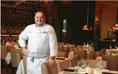  ??  ?? Perry’s traditiona­l steakhouse menu is the purview of corporate chef Grant Hunter.