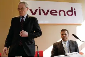  ?? (Jacky Naegelen/Reuters) ?? AMOS GENISH (right), then-GVT’s CEO and now chief convergenc­e officer of Viviendi, and then-Vivendi CEO Jean-Bernard Lévy attend a news conference in Paris in 2011.