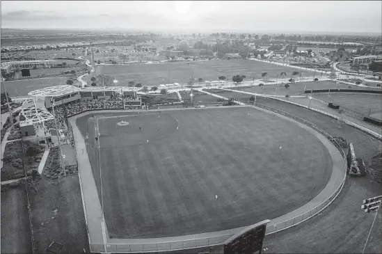  ?? Photograph­s by Allen J. Schaben Los Angeles Times ?? GREAT PARK in Irvine is about a two-hour drive from USC. “This was the best option on short notice,” says Rock Hudgens, USC’s director of baseball operations.