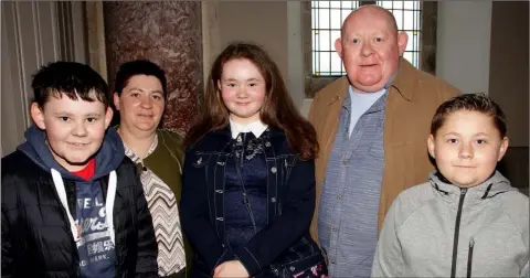  ??  ?? Rathangan NS pupil Shauna Kearns at her Confirmati­on in Rathangan church, with her parents Cathy and John and brothers John and