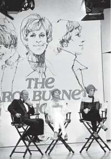  ?? AP PHOTO/GEORGE BRICH ?? Television host Carol Burnett, center, sits with Tim Conway and Vicki Lawrence, on the set during taping of her final episode of “The Carol Burnett Show” for CBS-TV in Los Angeles on March 17, 1978.