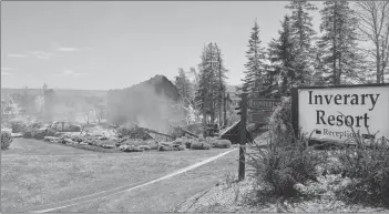  ?? DAVID JALA/CAPE BRETON POST ?? Thick, billowing smoke comes from the remains of the main reception building at the Inverary Resort on June 7.