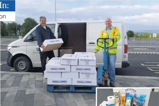  ??  ?? Gary Corden and Paul Jackson delivering food parcels, such as the one pictured right, to shielded residents.