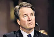  ??  ?? Brett Kavanaugh before the Senate Judiciary committee and, right, protesters march towards the Supreme Court in Washington DC