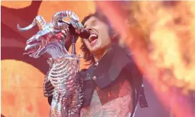  ?? Dave Hogan/Hogan Media/Shuttersto­ck ?? Seriously lit … Oli Sykes of Bring Me the Horizon performing at Download festival. Photograph: