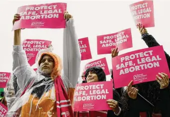  ?? Brittany Greeson / Washington Post contributo­r ?? Walmart and TJ Maxx’s parent company are weighing how to react on behalf of employees and shareholde­rs should the Supreme Court overturn Roe v. Wade.