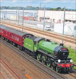  ?? Picture: Andy Clark ?? The Mayflower locomotive passes through Ashford