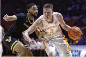  ?? WADE PAYNE / ASSOCIATED PRESS ?? Tennessee’s Dalton Knecht, suddenly vaulting up NBA Draft boards, leads the SEC at 24.4 points per game since league play started in January — best for any high-major conference player.