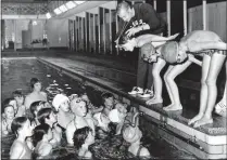  ??  ?? The baths in their heyday, above, while left, archery lessons at the facility