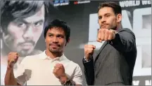  ?? PICTURE: GETTY IMAGES ?? FISTS OF FURY: Manny Pacquiao (left) and Chris Algieri during a press conference at The Venetian.