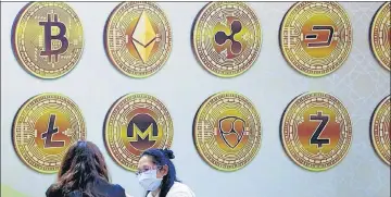  ?? REUTERS ?? In India, despite government threats of a ban, transactio­n volumes are swelling and 8 million investors now hold ₹10,000 crore in crypto-investment­s, according to industry estimates.
