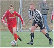  ?? Photo: Iain Ferguson, the Write Image. ?? South Lochaber Thistle captain, Martin Munro is pursued by Helensburg­h’s Jack Gorman.