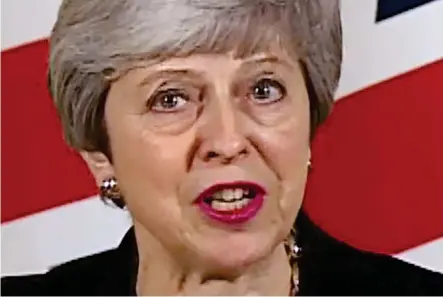  ??  ?? Plea: Theresa May issues her statement after a marathon Cabinet meeting in Downing Street yesterday