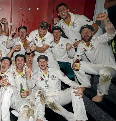  ?? GETTY IMAGES ?? The Australian dressing room was a joyous place after they won the fourth test against England to retain the Ashes.