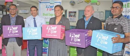  ?? Photo: Ronald Kumar ?? From left: Post Fiji Head of Retail & Marketing Isaac Mow, chief executive officer Anirudha Banshod and Minister for Women, Children and Poverty Alleviatio­n. Mereseini Vuniwaqa, Vula Shaw and Danesh Ram during the launching of Post Fiji groceries hamper packs in Suva on July 10, 2020.