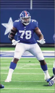  ?? Brandon Wade / Associated Press ?? New York Giants offensive tackle Andrew Thomas blocks against the Dallas Cowboys on Sunday.