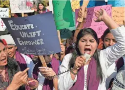  ?? K.M. CHAUDARY/AP ?? Activists from the group “Women Democratic Front” take part in a rally Wednesday to mark Internatio­nal Women’s Day in Lahore, Pakistan.