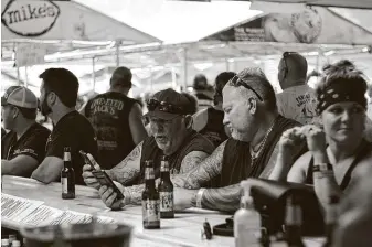  ?? Stephen Groves / Associated Press ?? Health officials say at least two people may have transmitte­d COVID-19 at One-Eyed Jack's Saloon during the 80th annual Sturgis Motorcycle Rally on Aug. 7 in Sturgis, S.D.