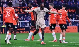  ?? Photograph: Aurélien Meunier/PSG/Getty Images ?? Ousmane Dembélé celebrates after scoring against Lorient on Wednesday.