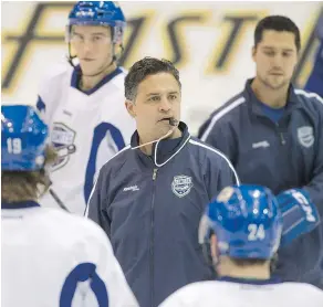  ?? ARLEN REDEKOP/PNG FILES ?? Comets head coach Travis Green, centre, has put the onus on Jake Virtanen to be a more fit, complete, two-way player. ‘We’ve been very honest with him,’ says Green.