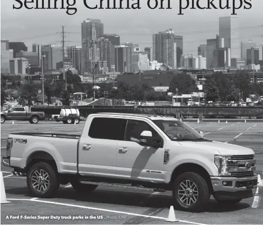  ??  ?? A Ford F-Series Super Duty truck parks in the US .