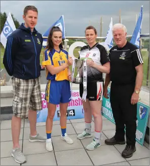  ??  ?? Roscommon manager Michael Finneran, captain Sinead Kenny with Sligo captain Noelle Gormley and manager Paddy Henry.