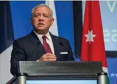  ?? Reuters ?? King Abdullah II delivers a speech on the first day of the UN Global Refugee Forum in Geneva yesterday