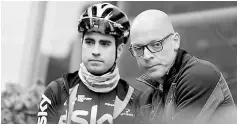  ??  ?? Team Sky chief Dave Brailsford talks to Mikel Landa of Spain before a training session in Alcudia, on the island of Mallorca, Spain. — Reuters photo