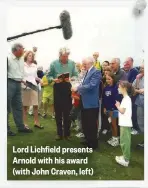  ??  ?? Lord Lichfield presents Arnold with his award (with John Craven, left)