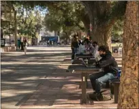  ?? MIGUEL GUTIERREZ JR.,— CALMATTERS ?? Students on campus at the University of California, Davis in 2022.
