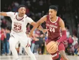  ?? SEAN RAYFORD/AP ?? Alabama star Brandon Miller played Wednesday night a day after police said he had delivered a gun to a teammate who’s charged in a fatal shooting.