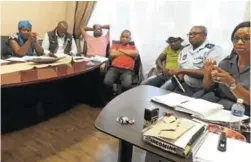  ?? Picture: DESMOND COETZEE ?? STERN WARNING: King William’s Town tavern owners take part in discussion­s with police and CPF members during a meeting held at the KWT police station on Monday evening