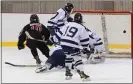  ?? RICH HUNDLEY III — FOR THE TRENTONIAN ?? Robbinsvil­le’s Mitch Ducalo (10) scores the winning goal against Notre Dame during the CVC Tournament final at Mercer County Rink on Friday afternoon.