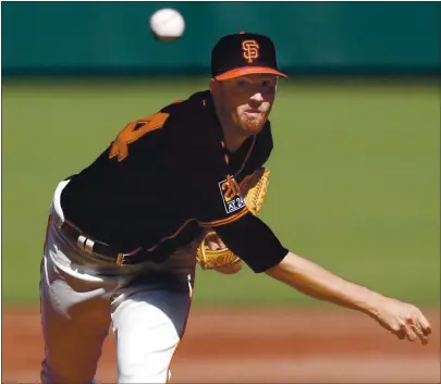  ?? KARL MONDON — STAFF PHOTOGRAPH­ER ?? Giants starting pitcher Kevin Gausman was considered a possible trade candidate, but the team chose to hold on to its assets.