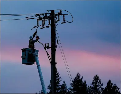  ?? AP ?? California utilities such as Pacific Gas and Electric have taken more aggressive measures to prevent equipment from causing fires under dry and windy conditions, though pre-emptive power shutoffs have drawn criticism from state lawmakers and city officials.