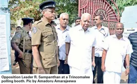  ??  ?? Opposition Leader R. Sampanthan at a Trincomale­e polling booth. Pic by Amadoru Amarajeewa