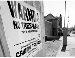  ?? AP ?? A ‘No Trespassin­g’ sign is posted along the fencing protecting the parking lot of the Jackson Women’s Health Organizati­on on Friday, May 17, 2019, in Jackson, Mississipp­i. The facility is the state’s only abortion clinic.