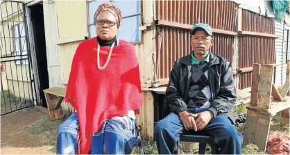  ?? Picture: BHONGO JACOB ?? TRAGIC ENDING: The parents of Sinovuyo Pendu, Ntombesith­athu and Mabhuti Tole, who died at an initiation camp in Khayelitsh­a outside Mdantsane at the weekend, are mourning the death of their only son
