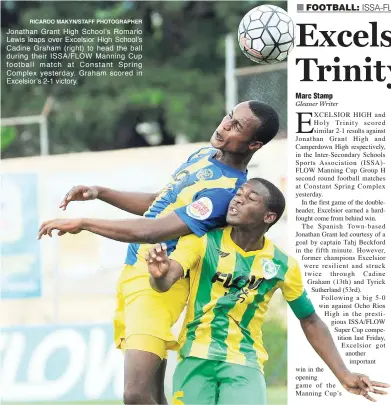  ?? RICARDO MAKYN/STAFF PHOTOGRAPH­ER ?? Jonathan Grant High School’s Romario Lewis leaps over Excelsior High School’s Cadine Graham (right) to head the ball during their ISSA/FLOW Manning Cup football match at Constant Spring Complex yesterday. Graham scored in Excelsior’s 2-1 victory.