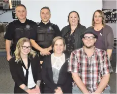  ??  ?? Community partners recognized for their contributi­on to John Howard Society’s project (s). Front row form left: Teagan Witko, Crystal Peterson, James Szwagiercz­ack. (Back row from left): Sgt. Kevin Pilsworth, Cst. Kyle Cunningham, Andrea Dyck and Lindsay Wilcox.