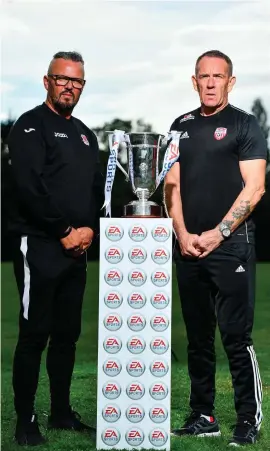  ?? SAM BARNES/SPORTSFILE ?? Cobh Ramblers manager Stephen Henderson, left, and Derry City boss Kenny Shiels at the EA Sports Cup final media day yesterday