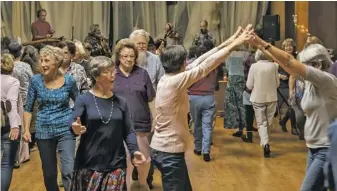  ?? BY RAY BOC ?? The First Community Square Dance, organized by Rapp at Home and RAAC, drew a large and happy crowd. Lyt Wood and his Mudlarks, accompanie­d by Fiddler Steve Hickman, played the perfect dance music, while DeLaura Padovan led the group in square dance moves. Commented Rapp at Home: “It was our gift to the community and it fulfilled our hope, that a cross-section of the community would come and just have fun!From 80-plus to 5 years old, we doe-si doed and reeled with smiles.”