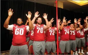  ?? File photo ?? Arkansas Razorback football players call the Hogs at the start of the annual “Kickoff Luncheon” in 2016. The team kicks off the 2017 season Aug. 18 at the Northwest Arkansas Convention Center in Springdale.
