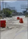  ?? (AP/Odelyn Joseph) ?? A street alongside the U.S. Embassy compound is devoid of traffic in Port-au-Prince, Haiti, on Sunday.